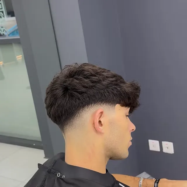 A textured crop with a soft skin fade cut by Abde
